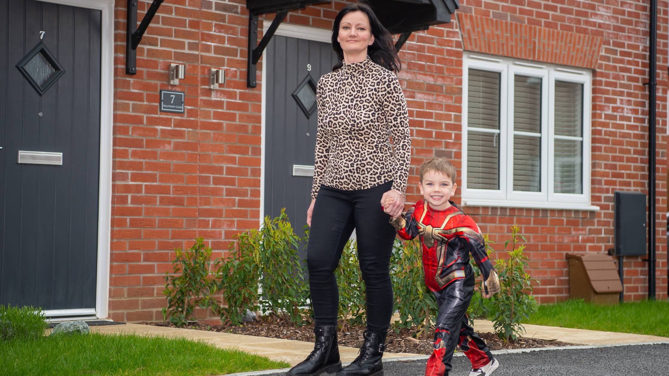 Bromford customer and her son walking outside
