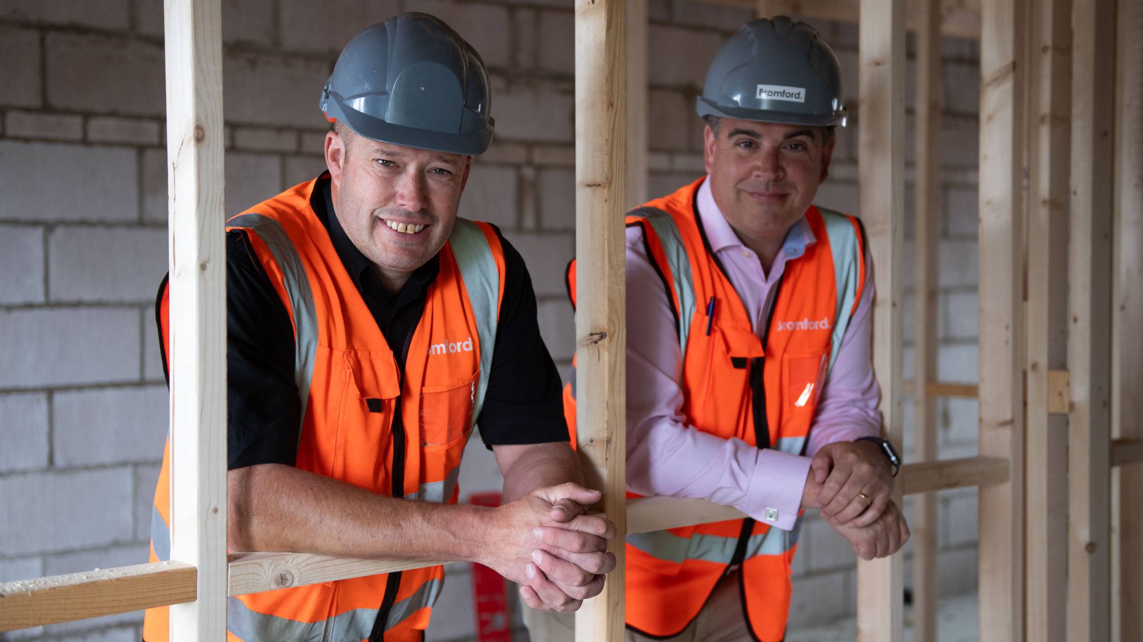 James and Simon inside a part built home.